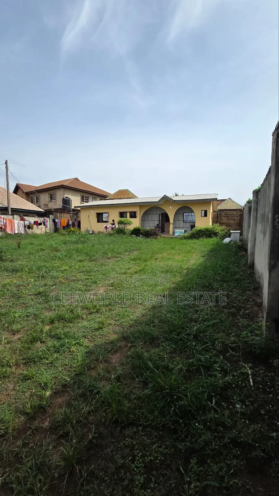 A Standard Plot Of Land At Progressive Estate On A Tarred Road in Akala Express