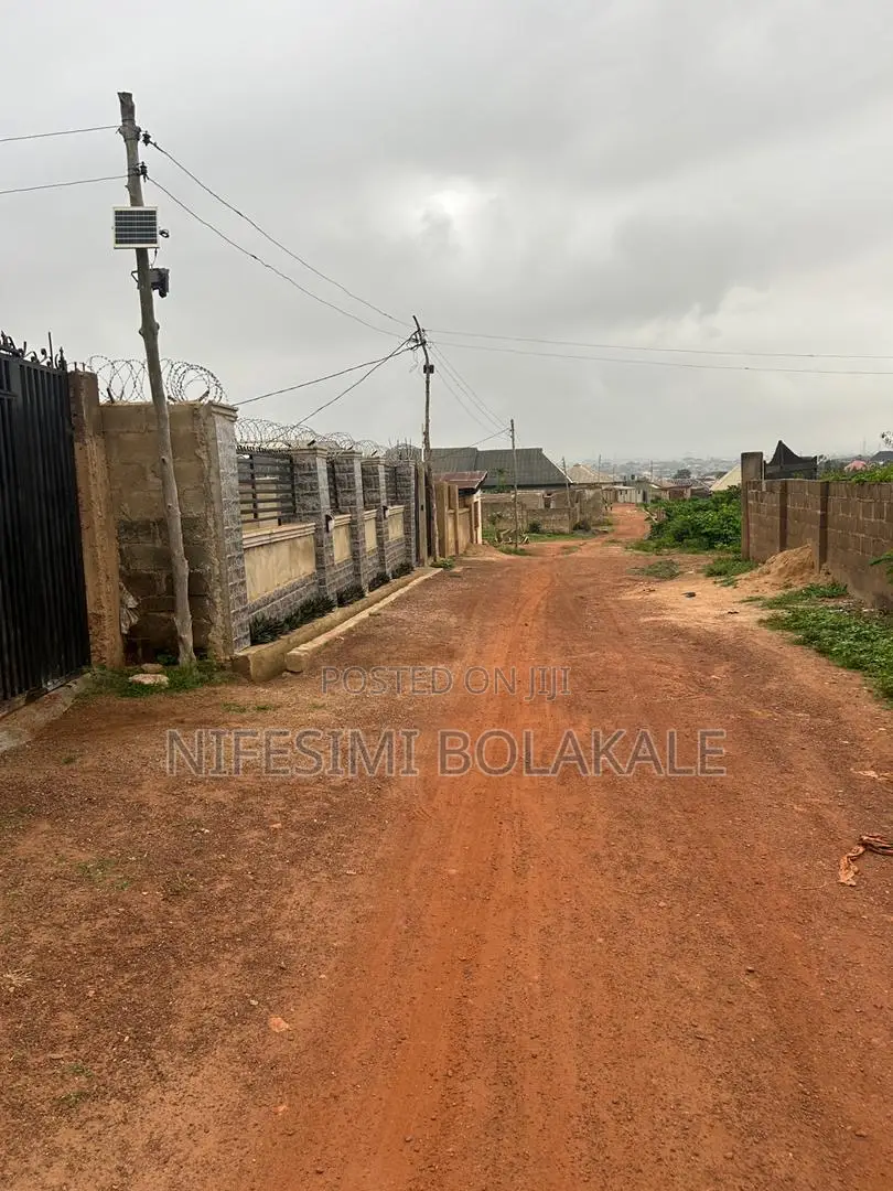 Fenced and Gated 2plots of Land With C of O at Bola Estate, Elebu in Akala Express