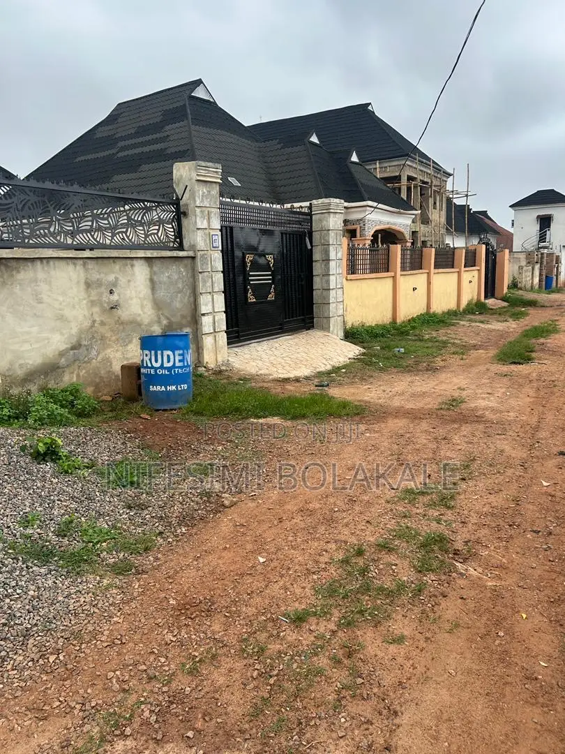 Fenced and Gated 2plots of Land With C of O at Bola Estate, Elebu in Akala Express