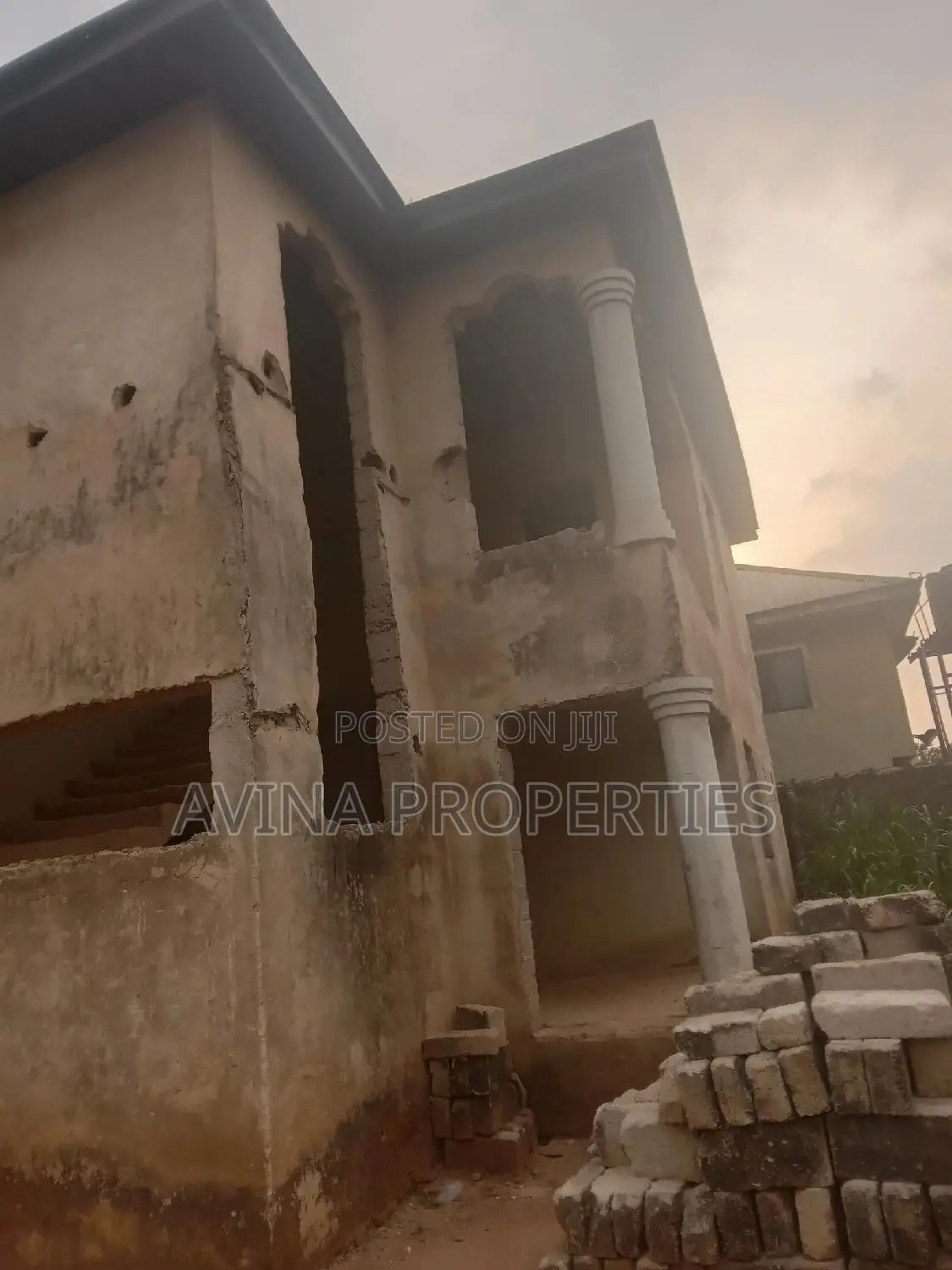 A Storey Building of 14 Room's to Converterble Flats 85% in Owerri