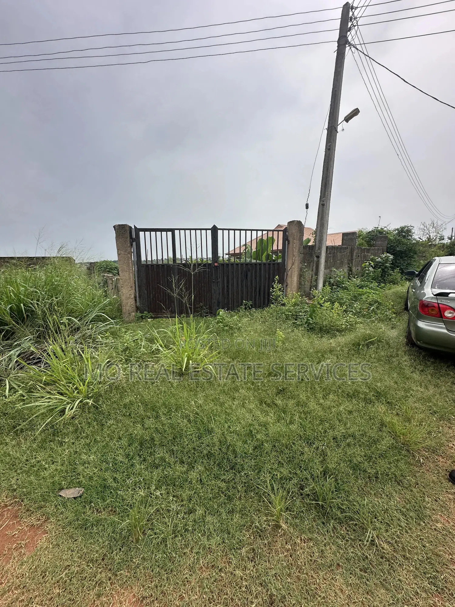 A Plot of Land With Fence and Gate at Unity Estate Laderin in Abeokuta South