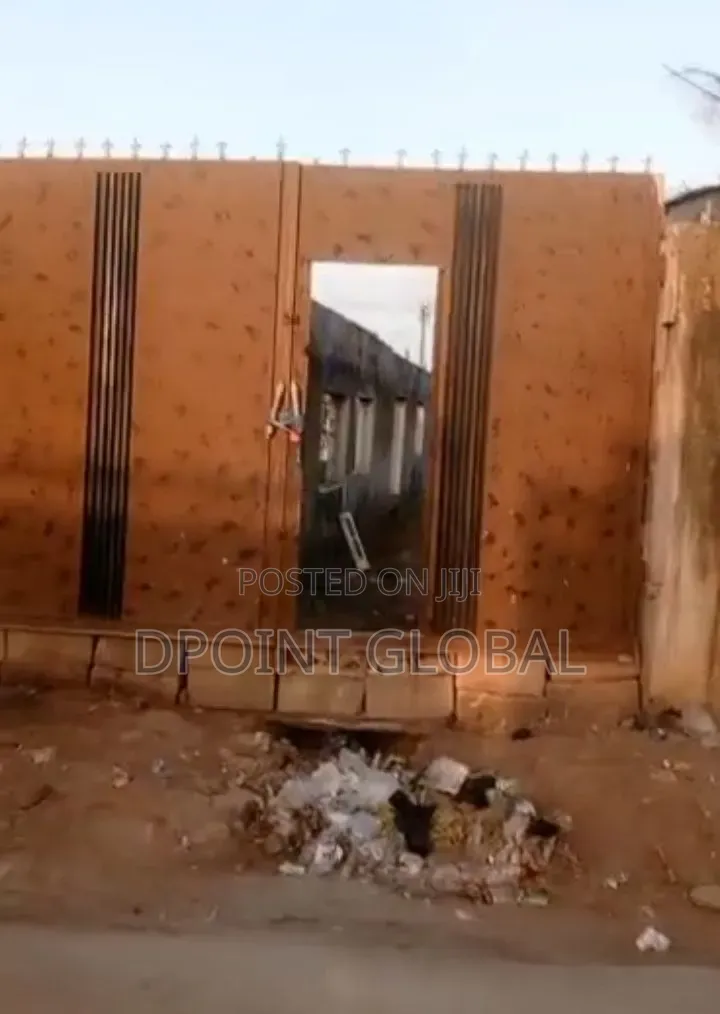 Half Plot of Land With Shops , Facing Road Construction in Ayobo in Ayobo