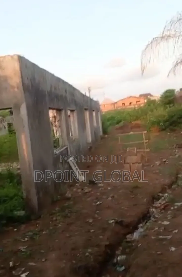 Half Plot of Land With Shops , Facing Road Construction in Ayobo in Ayobo