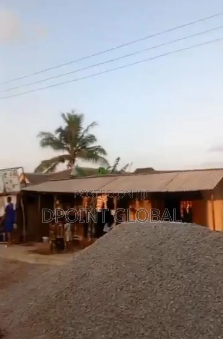 Half Plot of Land With Shops , Facing Road Construction in Ayobo in Ayobo