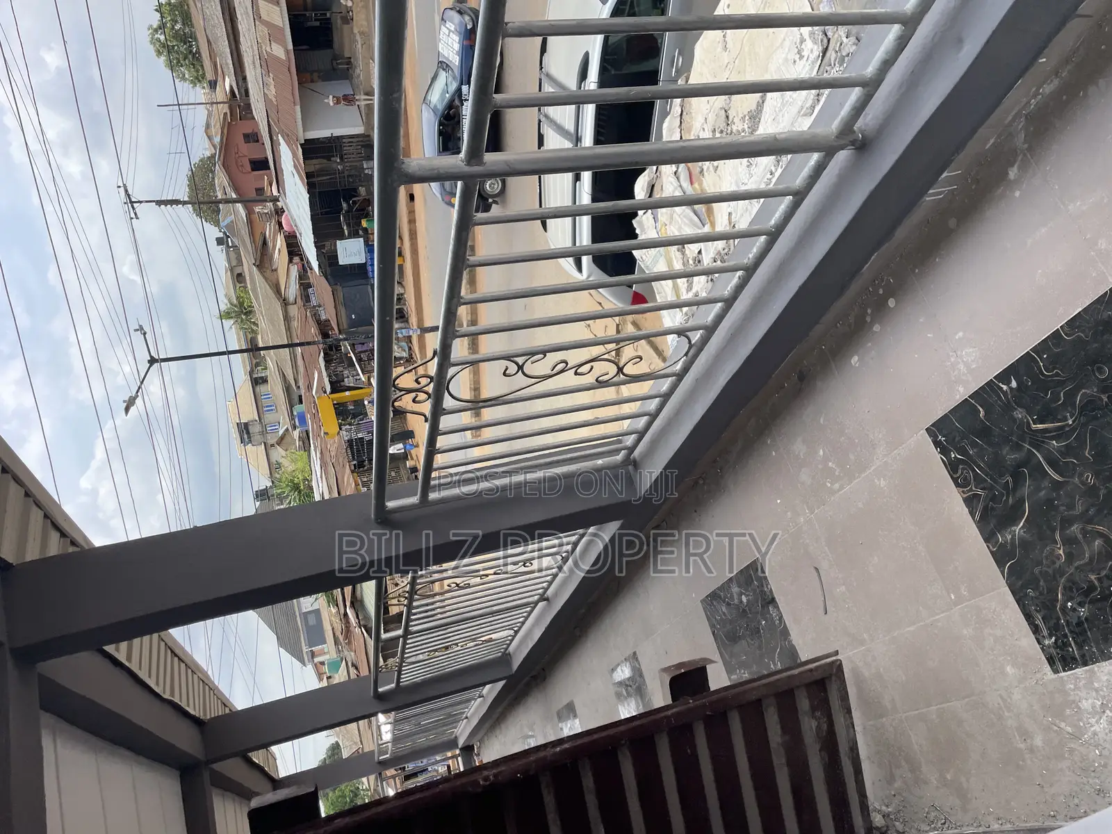 A Standard Shop on a Busy Tarred Road in Abule Egba