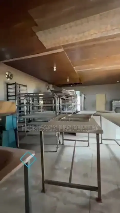 Warehouse With Four Units of Self Contain Apartments at Iwofe Road in Obio-Akpor