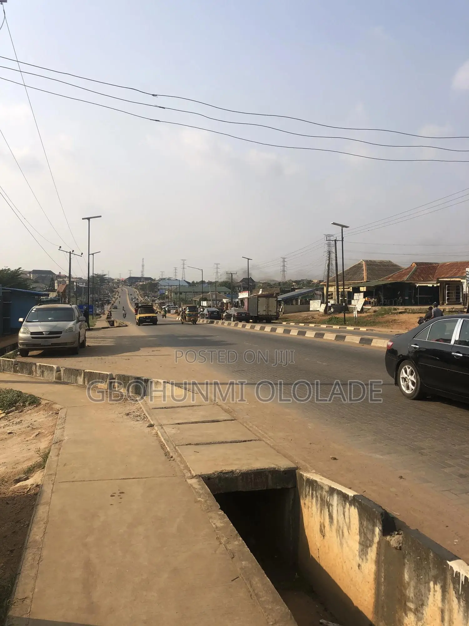 2 Plots With a 3-Bed Flat 2 Shops Facing the Major Road at Ginti. in Ijede / Ikorodu