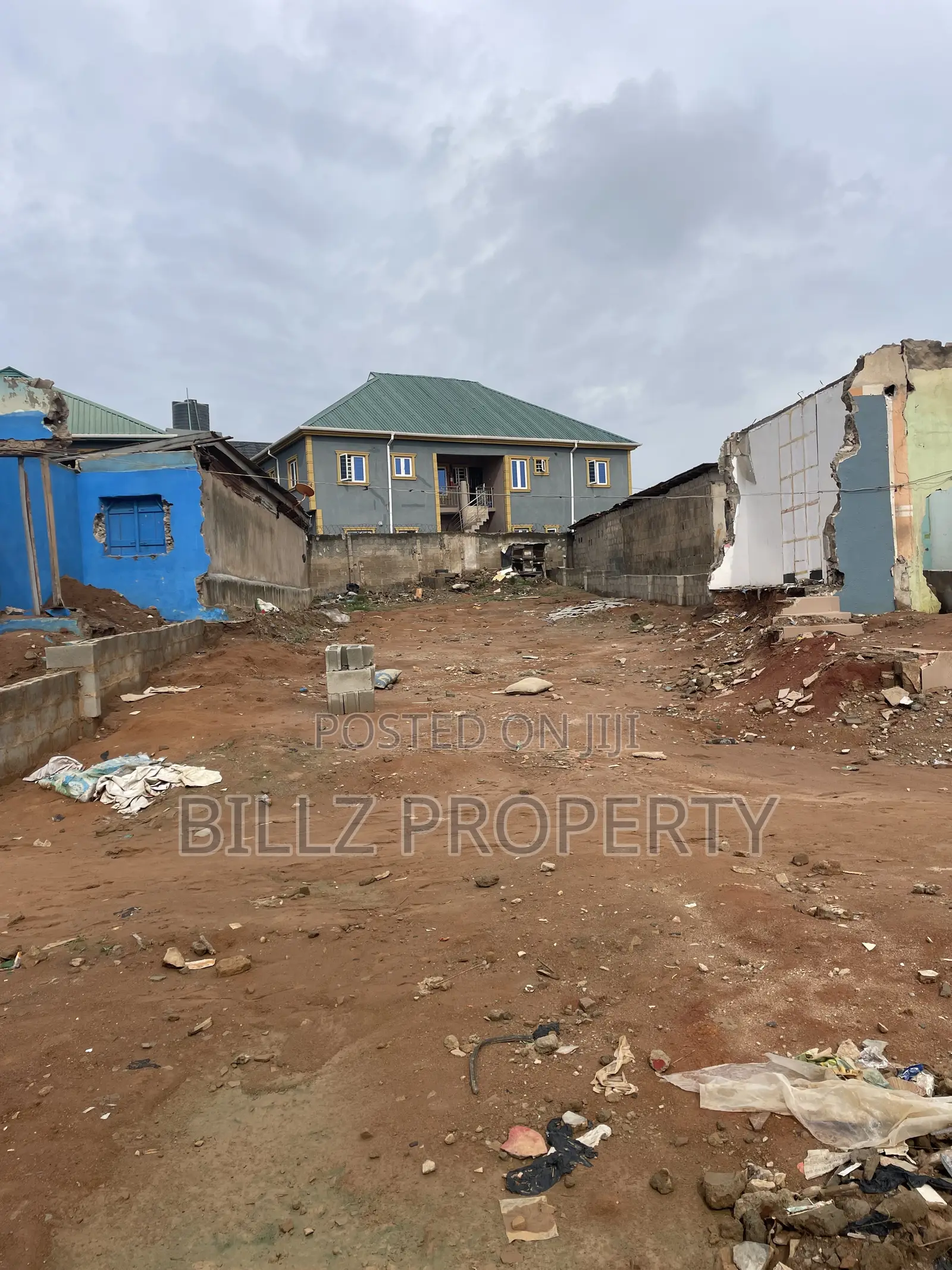 A More Than a Half Plot of Land on a Very Busy Tarred Road in Abule Egba
