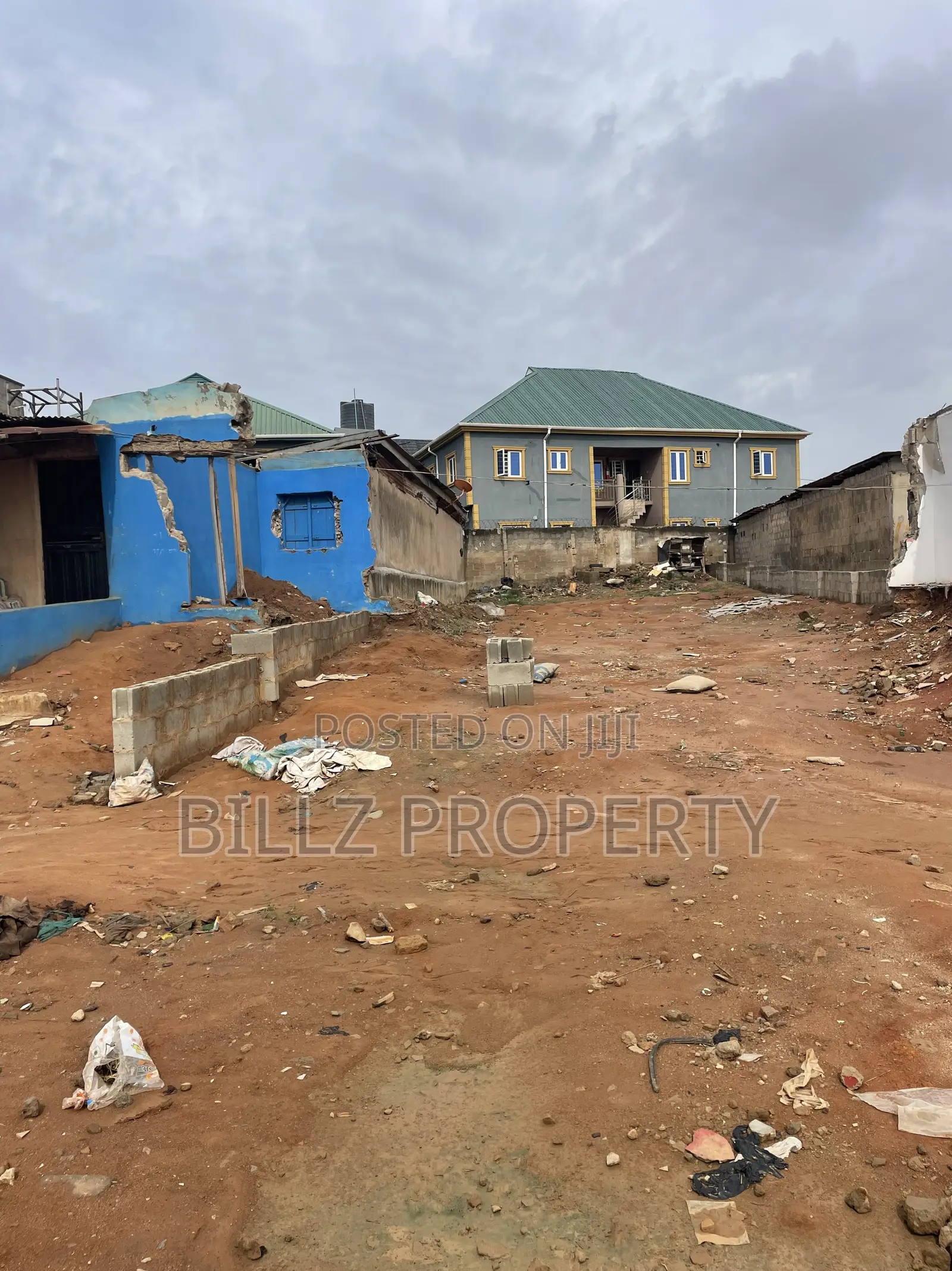 A More Than a Half Plot of Land on a Very Busy Tarred Road in Abule Egba