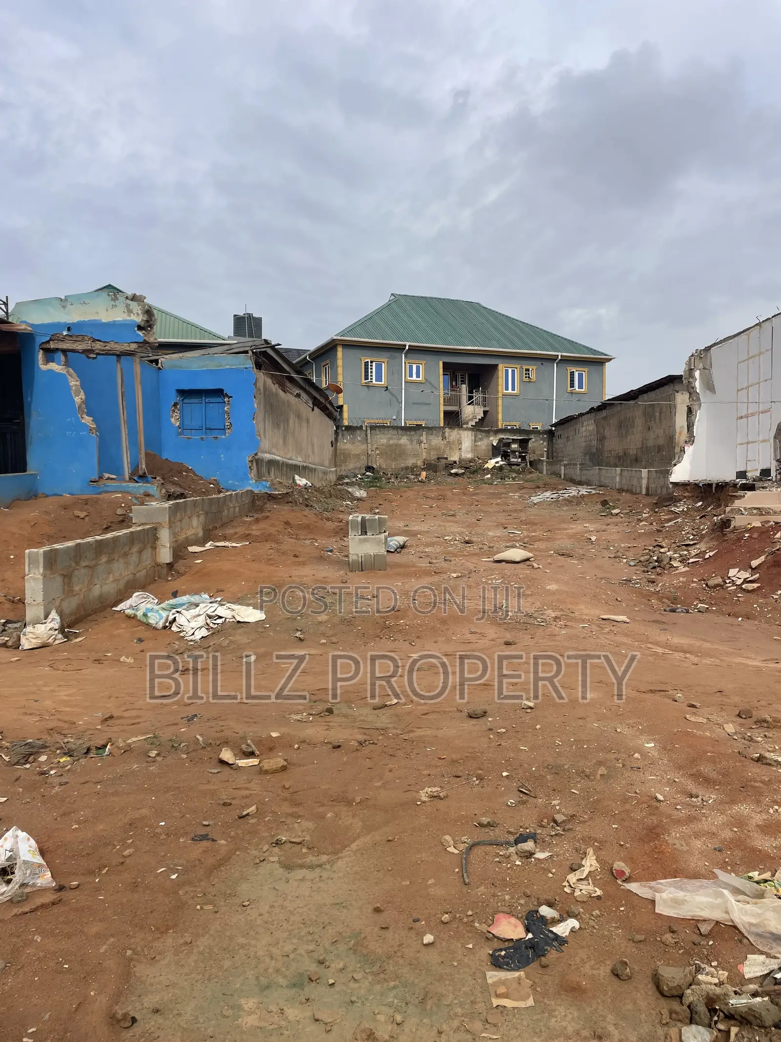 A More Than a Half Plot of Land on a Very Busy Tarred Road in Abule Egba