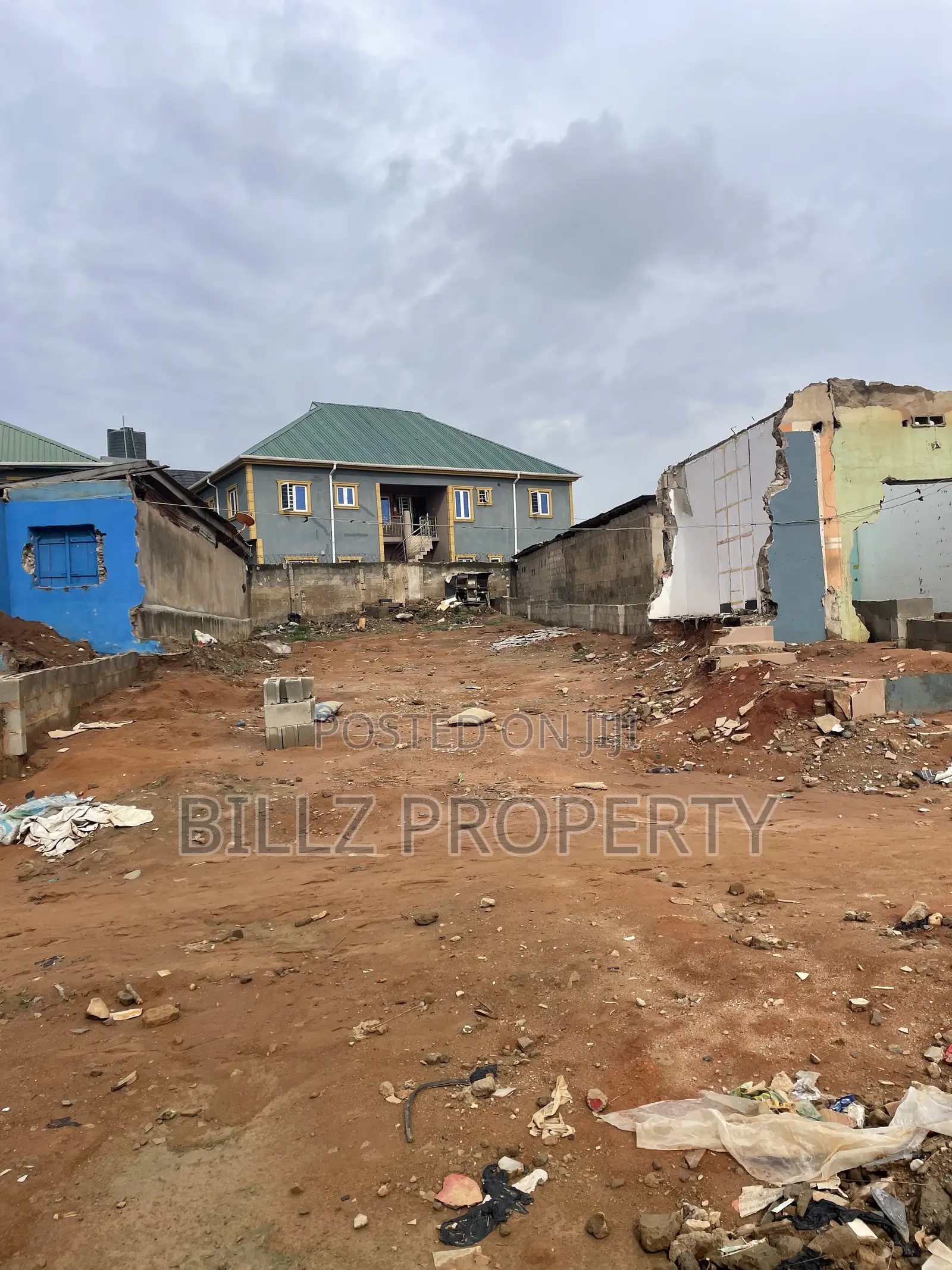 A More Than a Half Plot of Land on a Very Busy Tarred Road in Abule Egba
