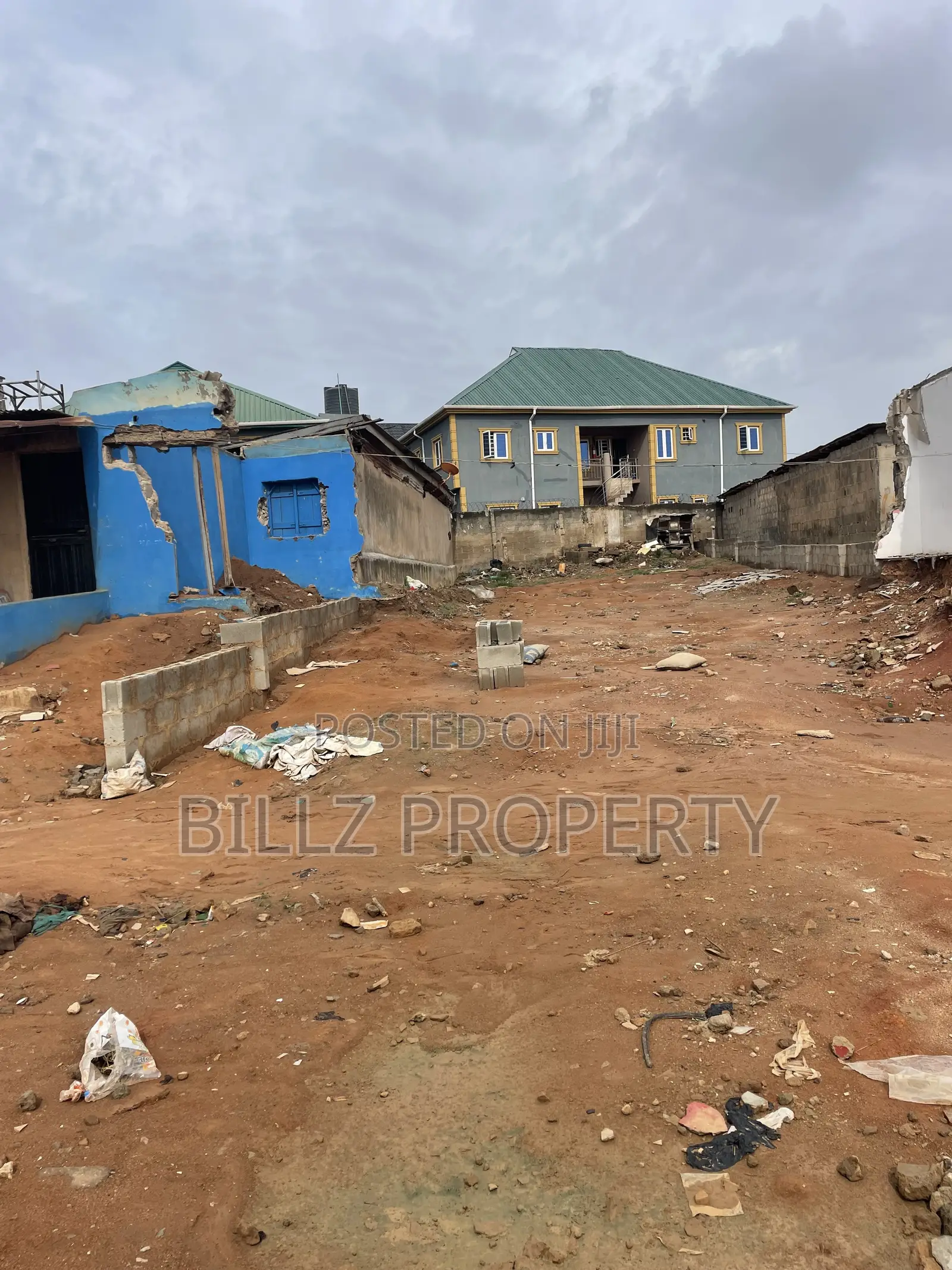 A More Than a Half Plot of Land on a Very Busy Tarred Road in Abule Egba