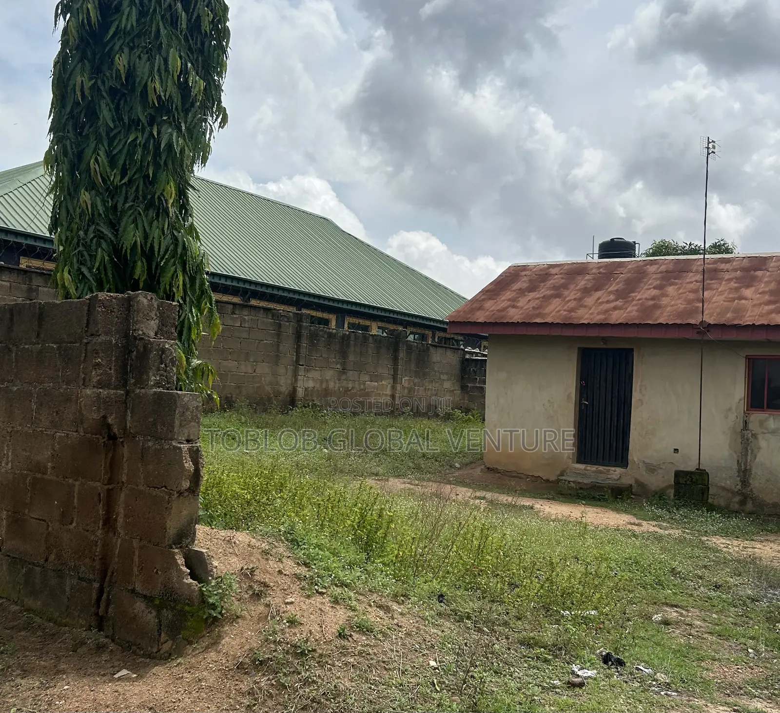 Land for Sale With Building on the Property in Akala Express
