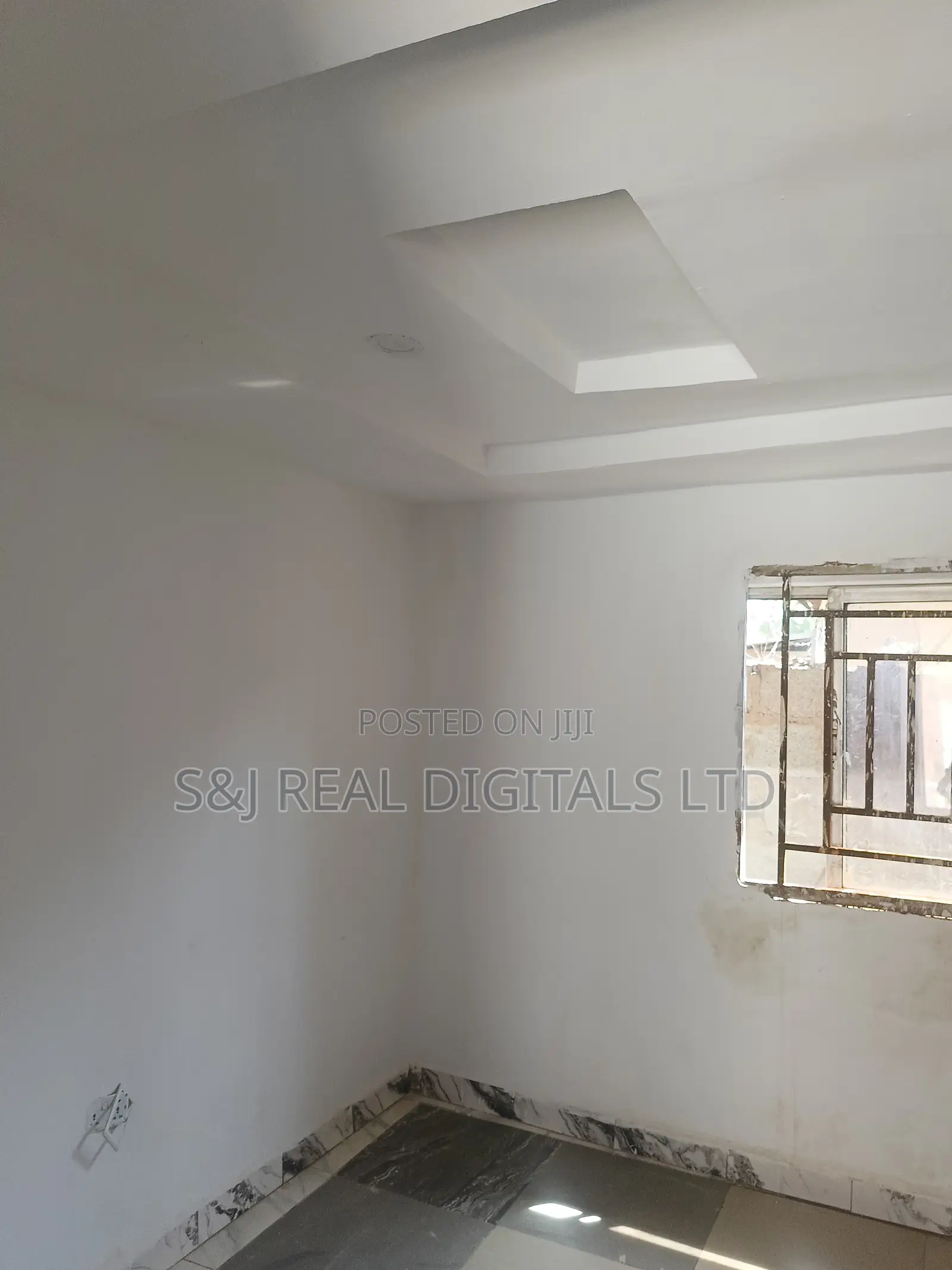 A 60sqm Shop Space Serviced With a Central Generator in Wuse 2