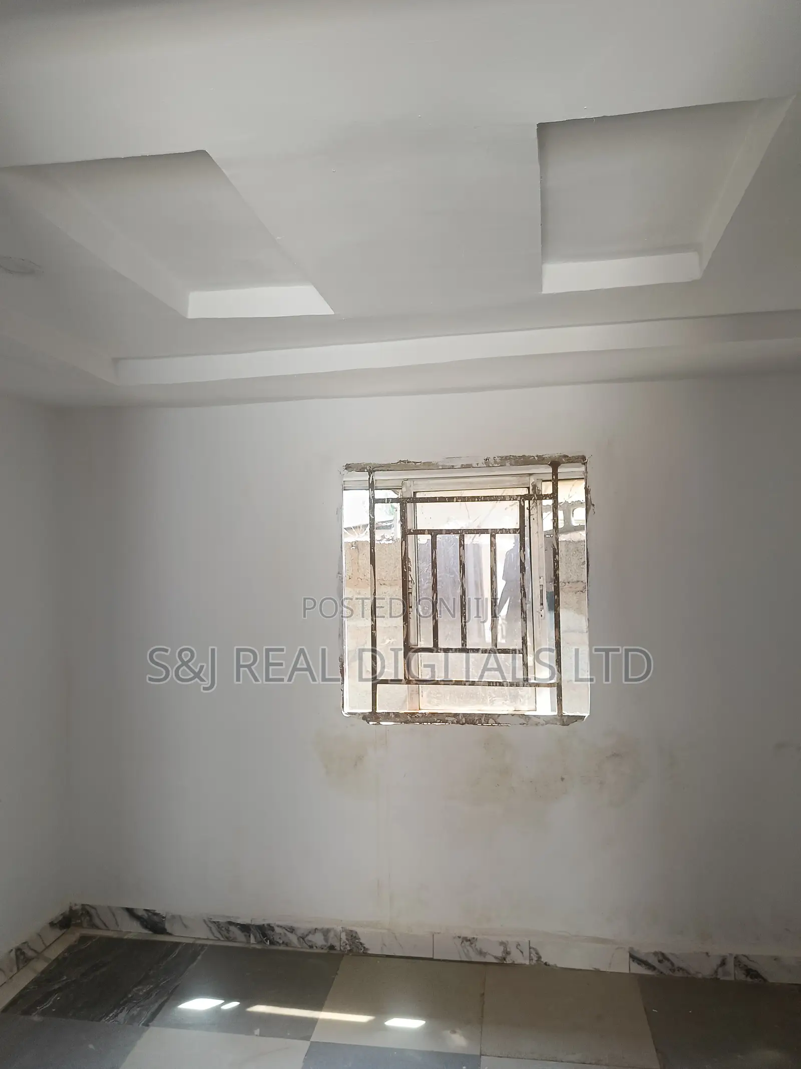 A 60sqm Shop Space Serviced With a Central Generator in Wuse 2
