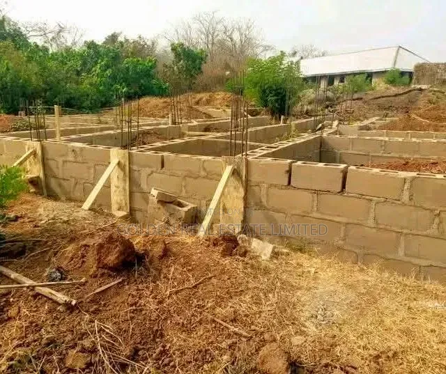 A Plot of Land With 10 Rooms Self Contain at Foundation Level in Oye