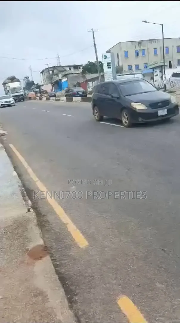 Commercial Half Plot Of Land Along Ekoro Road In Abule Egba in Abule Egba