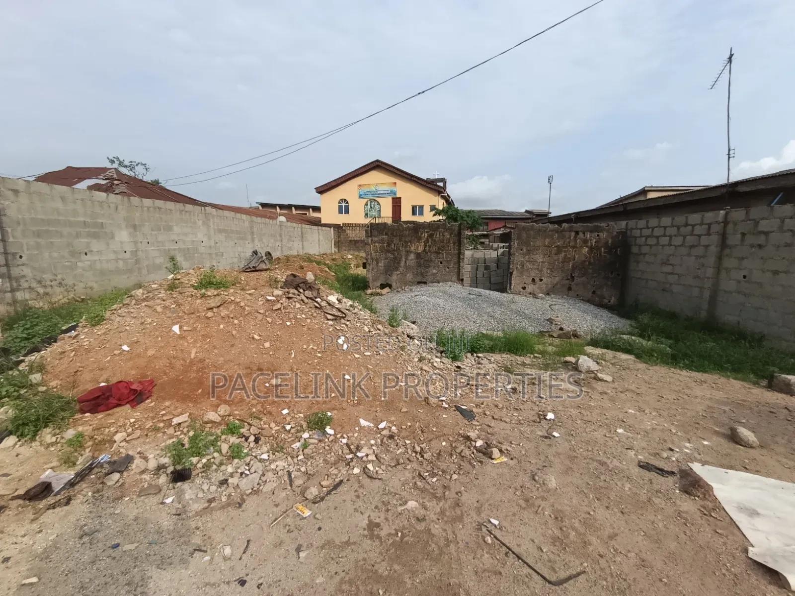 Full Plot of Land in a Very Busy Area on a Tarred Road in Cement