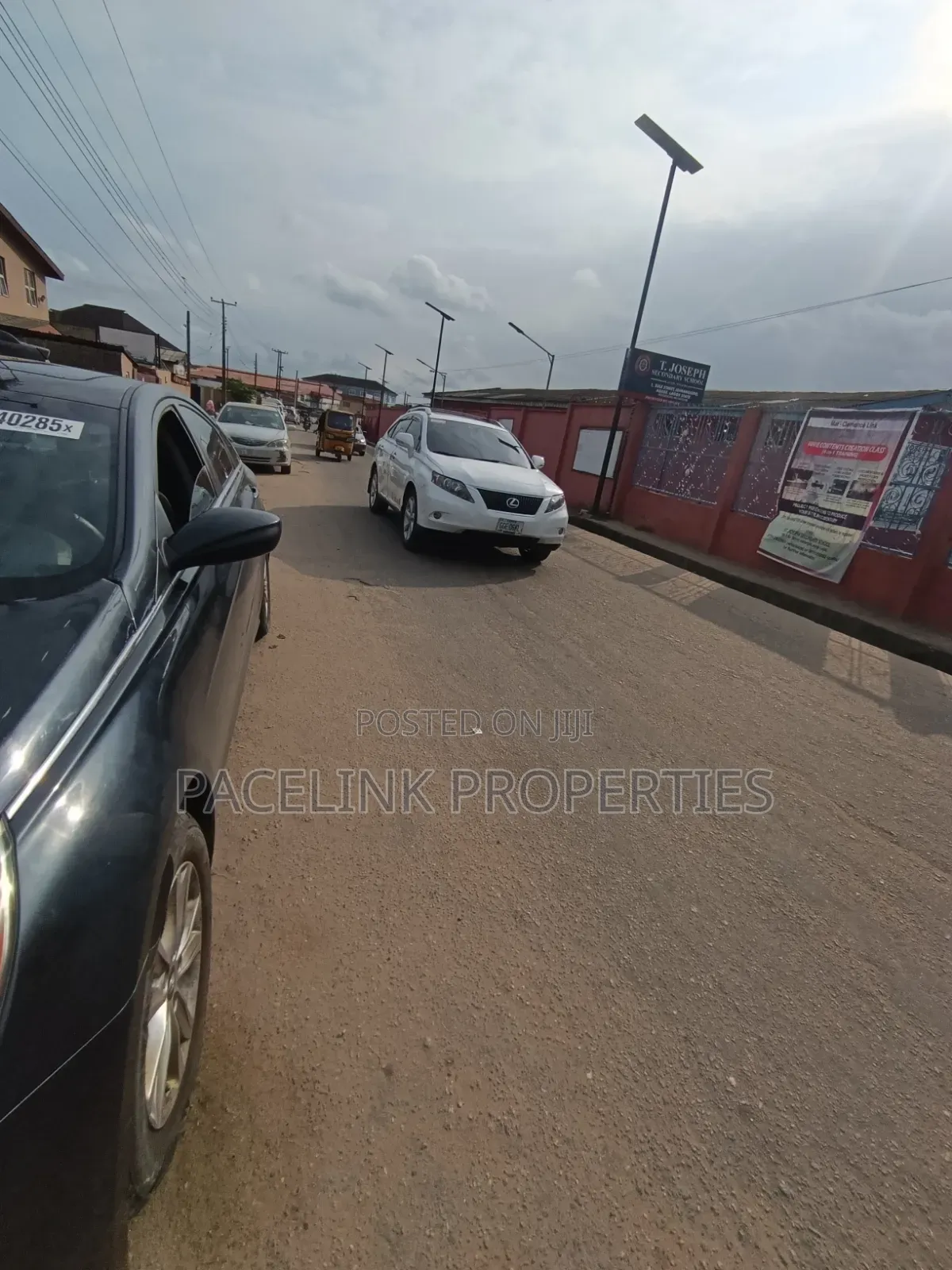 Full Plot of Land in a Very Busy Area on a Tarred Road in Cement