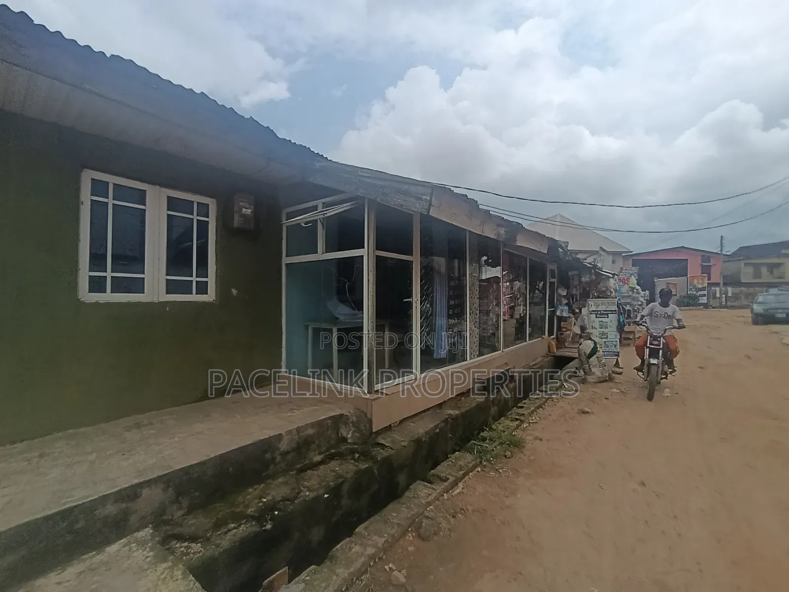 Half Plot of Land Corner Pieces on a Tarred Road in Baruwa