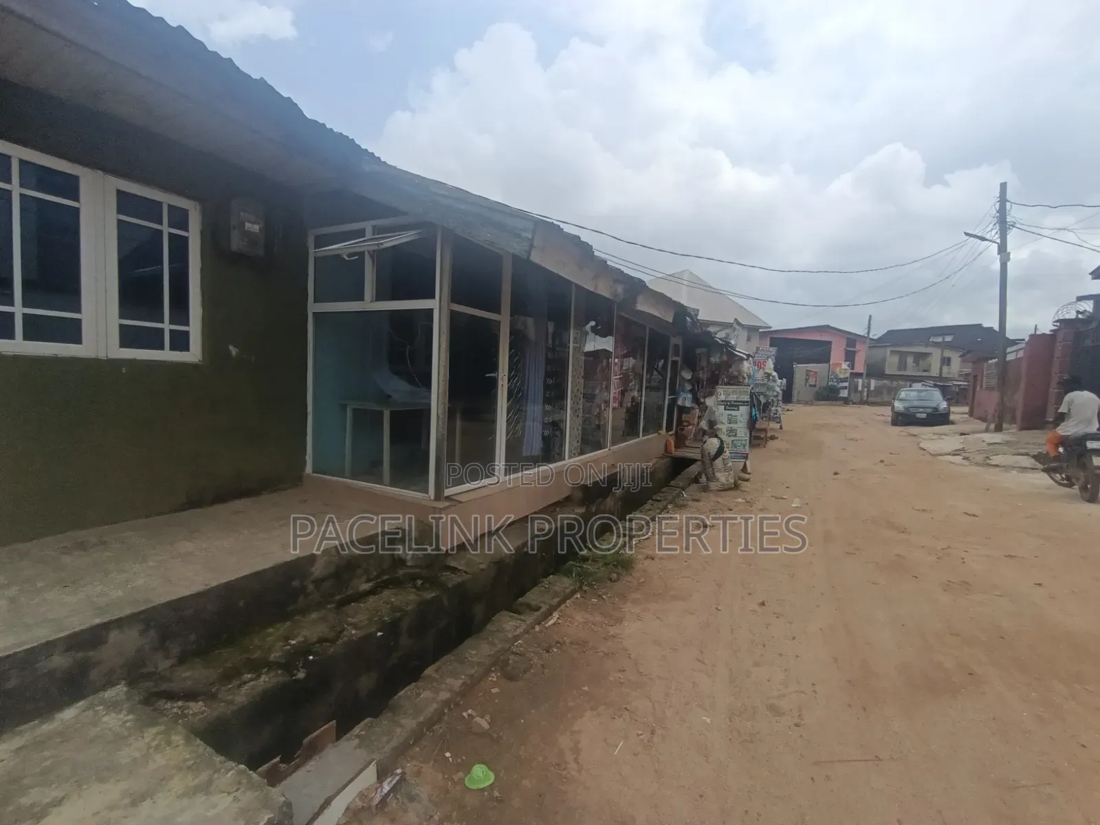 Half Plot of Land Corner Pieces on a Tarred Road in Baruwa