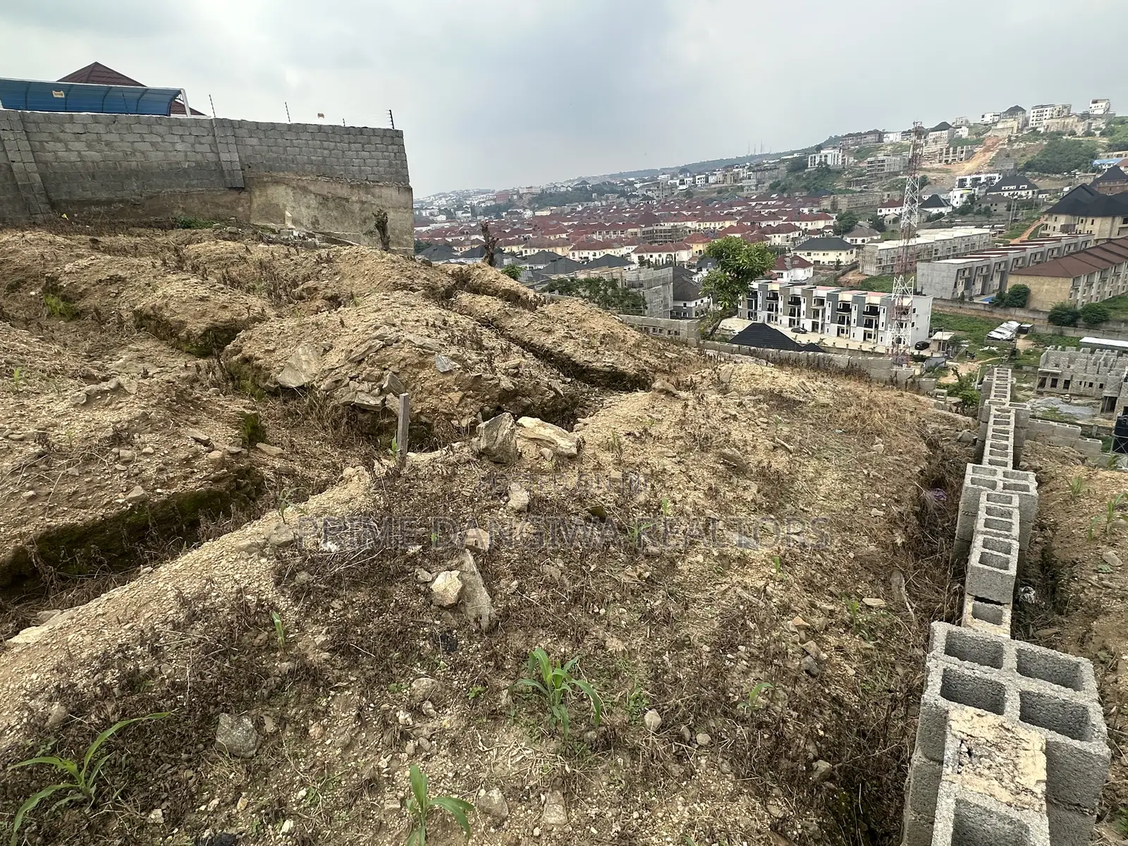 A Residential Plot of Land Measuring About 700 SQM at Apo Shefa House in Apo District
