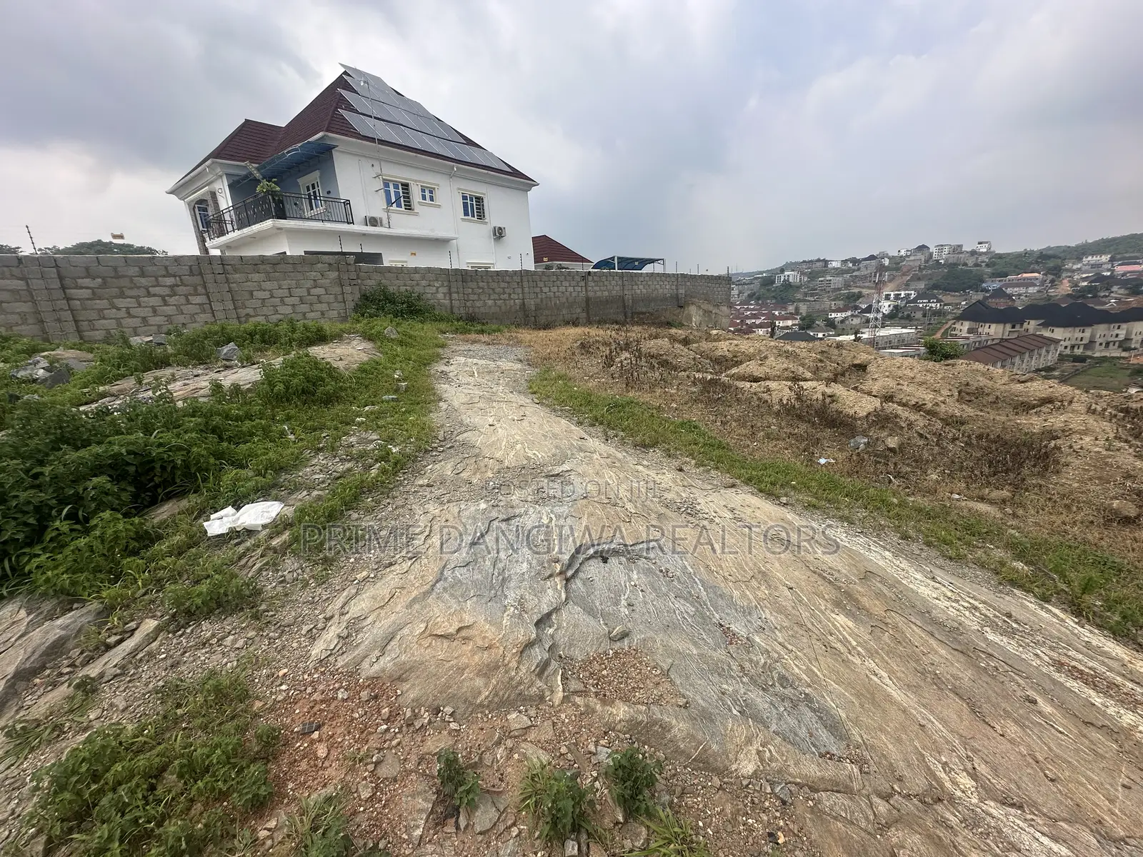 A Residential Plot of Land Measuring About 700 SQM at Apo Shefa House in Apo District