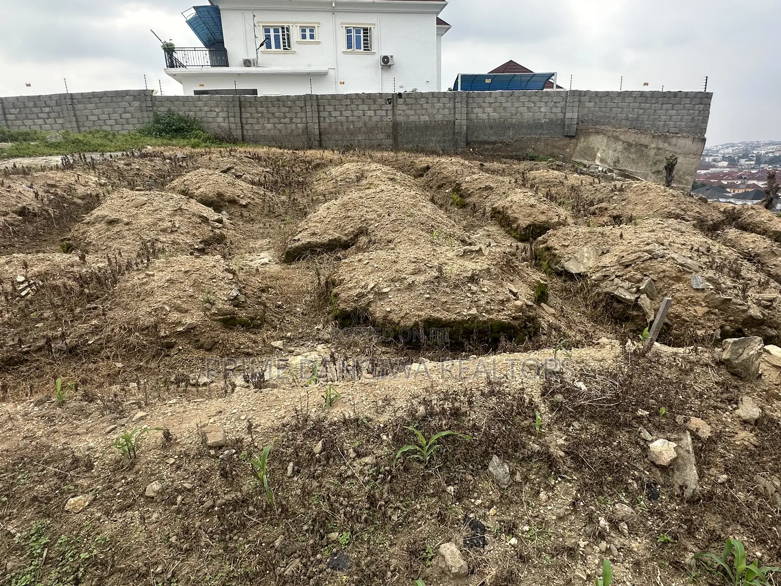 A Residential Plot of Land Measuring About 700 SQM at Apo Shefa House in Apo District