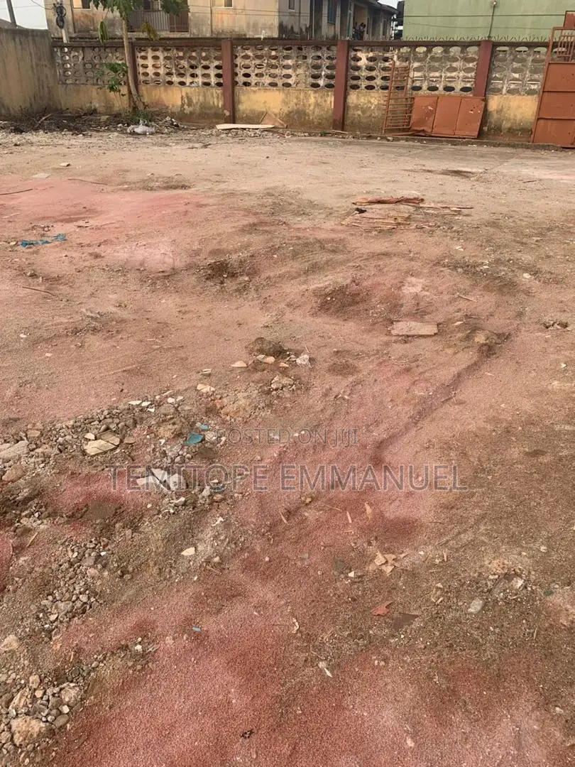 Well Fenced Round Table One and Half Plot of Land in Agege