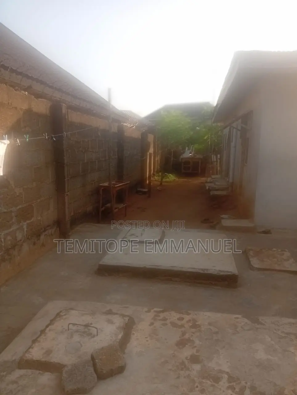 Half Plot of Land Fenced on a Major Road in Abule Egba