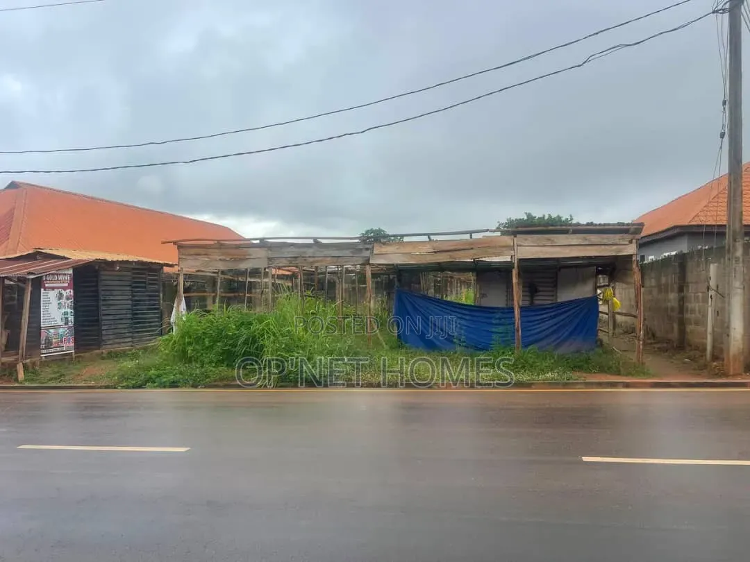 A Plot of Land With an Uncompleted Building Facing a Major Road in Akure