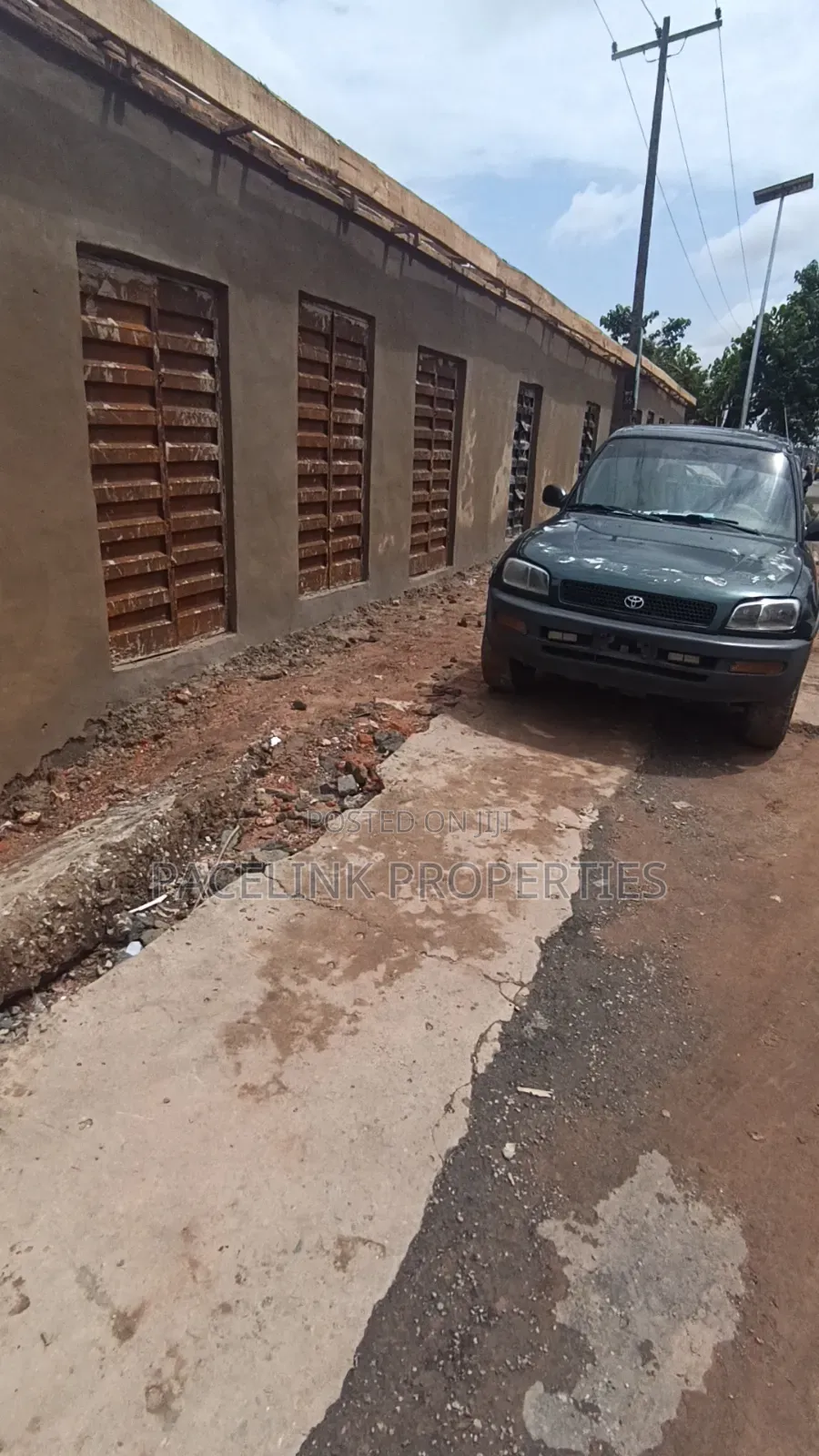 Newly Built Double Shop Along the Main Road for Sales. in Iyana Ipaja