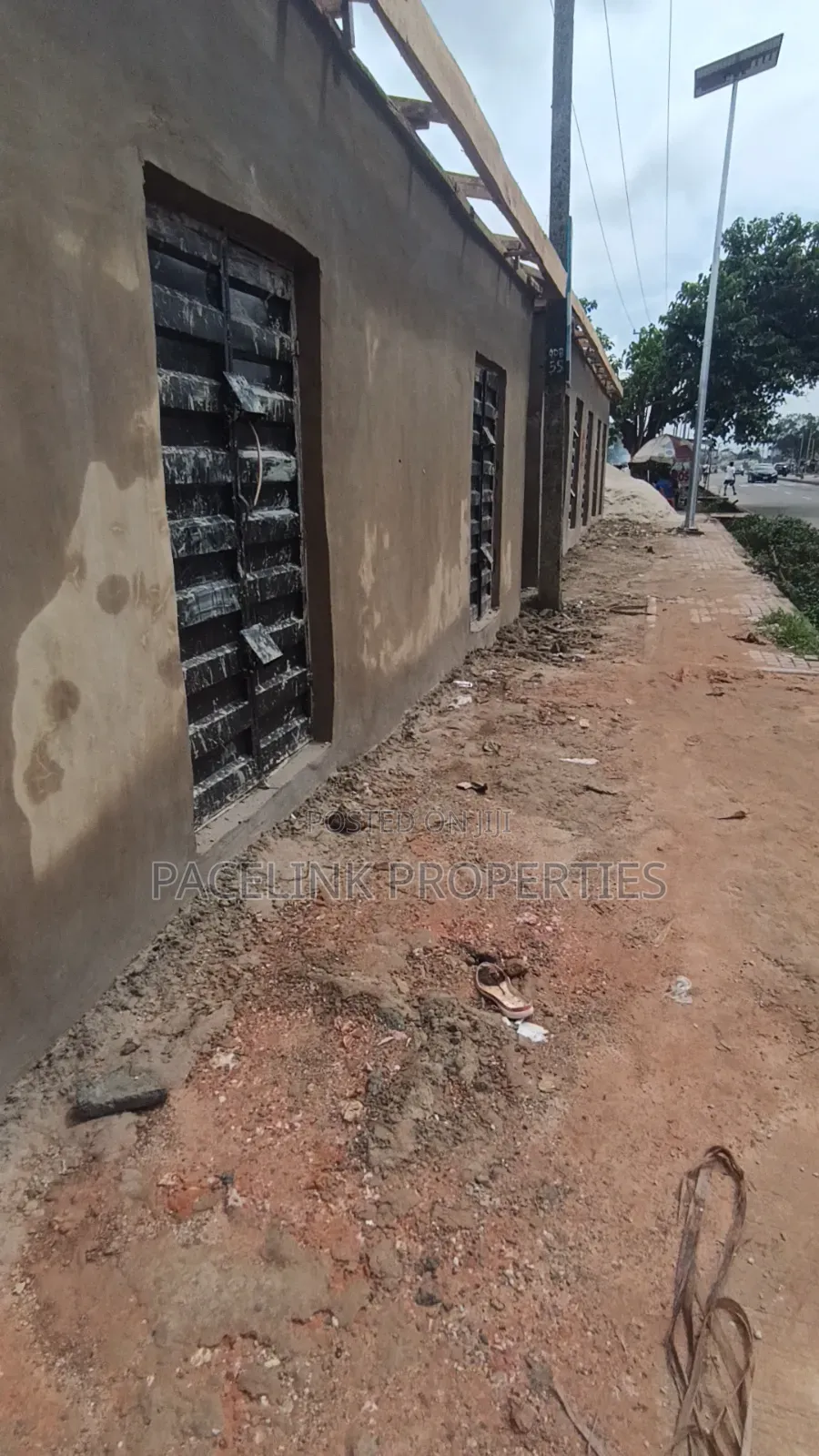 Newly Built Single Shop Along the Main Road for Sales. in Iyana Ipaja