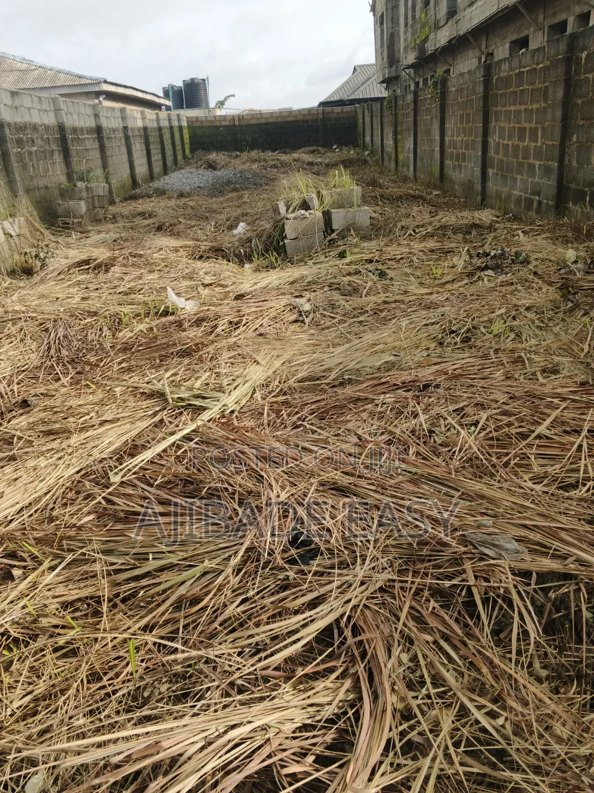 Half Plot of Land Fence Gated Very Close to the Tarred Road in Ayobo