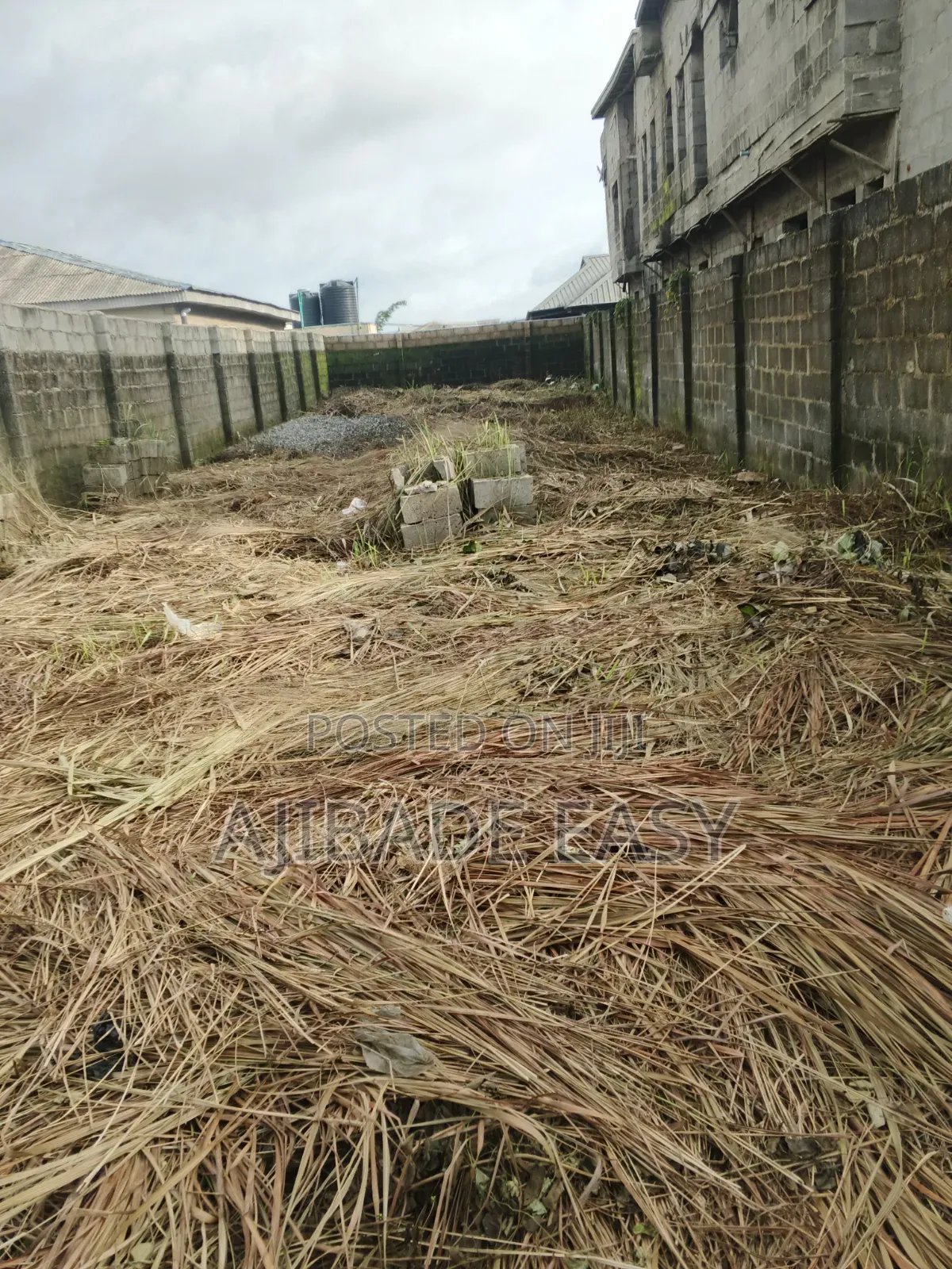 Half Plot of Land Fence Gated Very Close to the Tarred Road in Ayobo