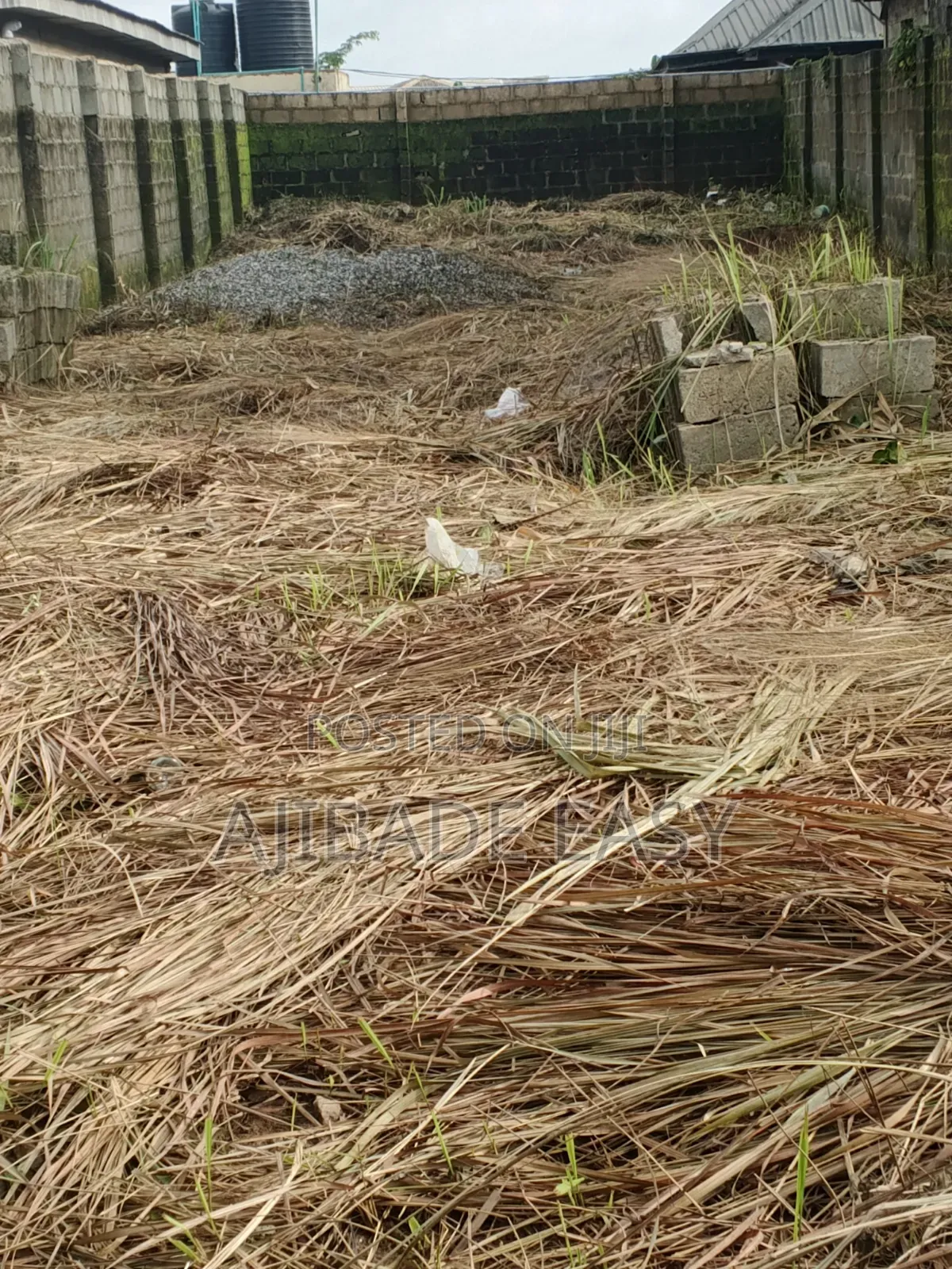 Half Plot of Land Fence Gated Very Close to the Tarred Road in Ayobo