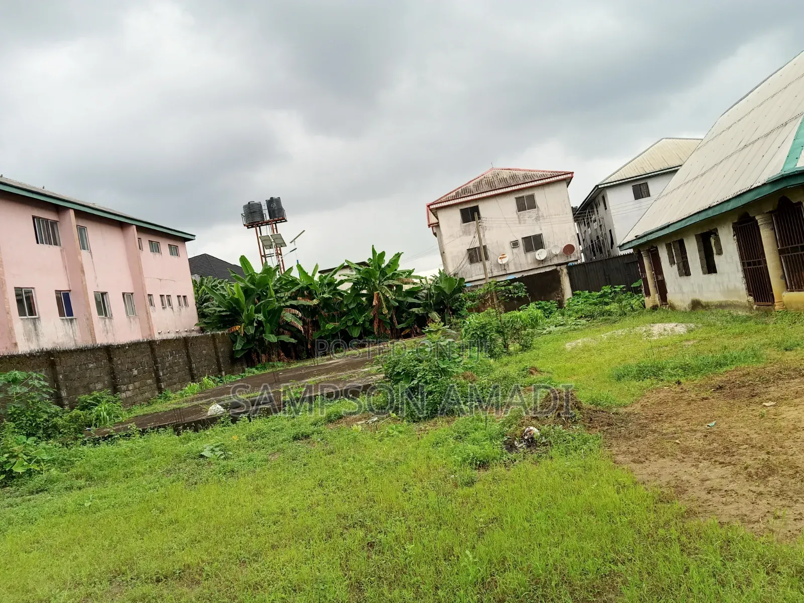 Four and Half Plot of Land for Sale With Buildings Inside in East West Road
