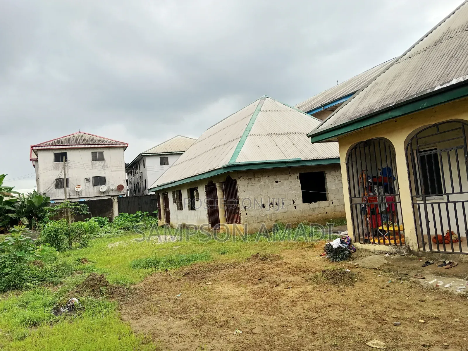 Four and Half Plot of Land for Sale With Buildings Inside in East West Road
