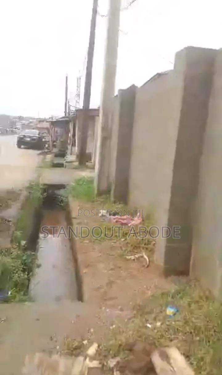 Fenced and Gated Full Plot Facing a Busy Road for Sale in Abaranje