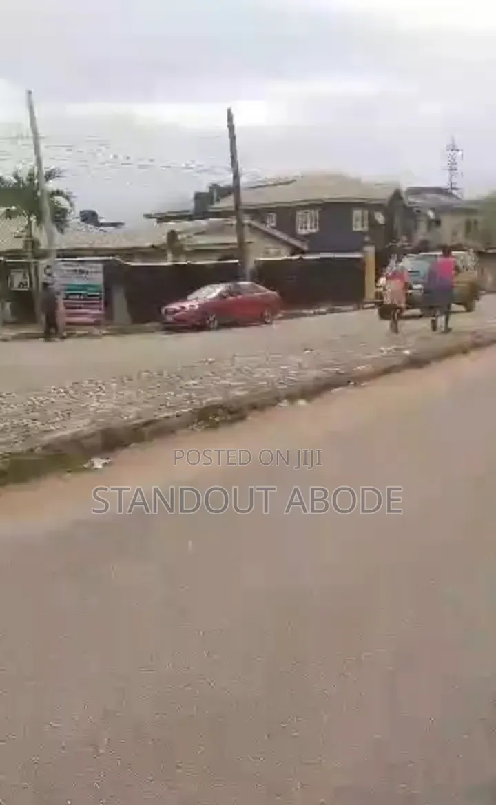 Fenced and Gated Full Plot Facing a Busy Road for Sale in Abaranje