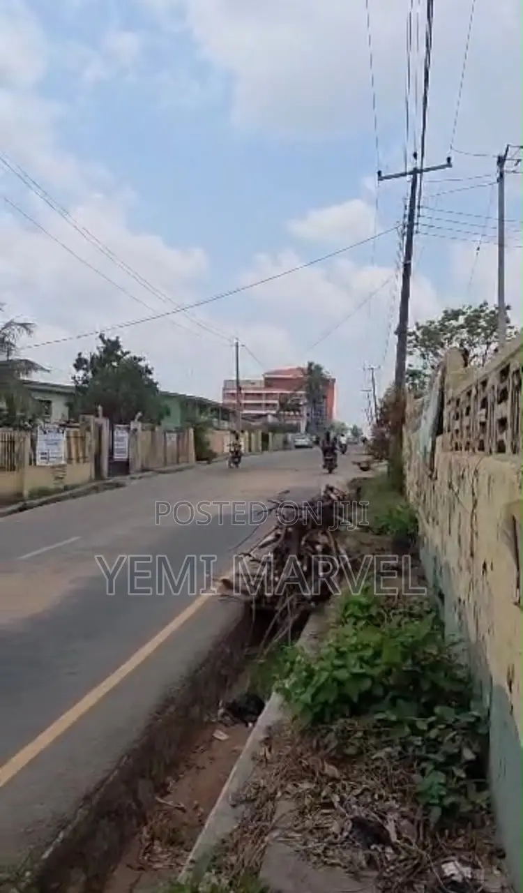 Fully Fenced and Gated 1,343sqm Prime Commercial Land With C of O in Adamasingba