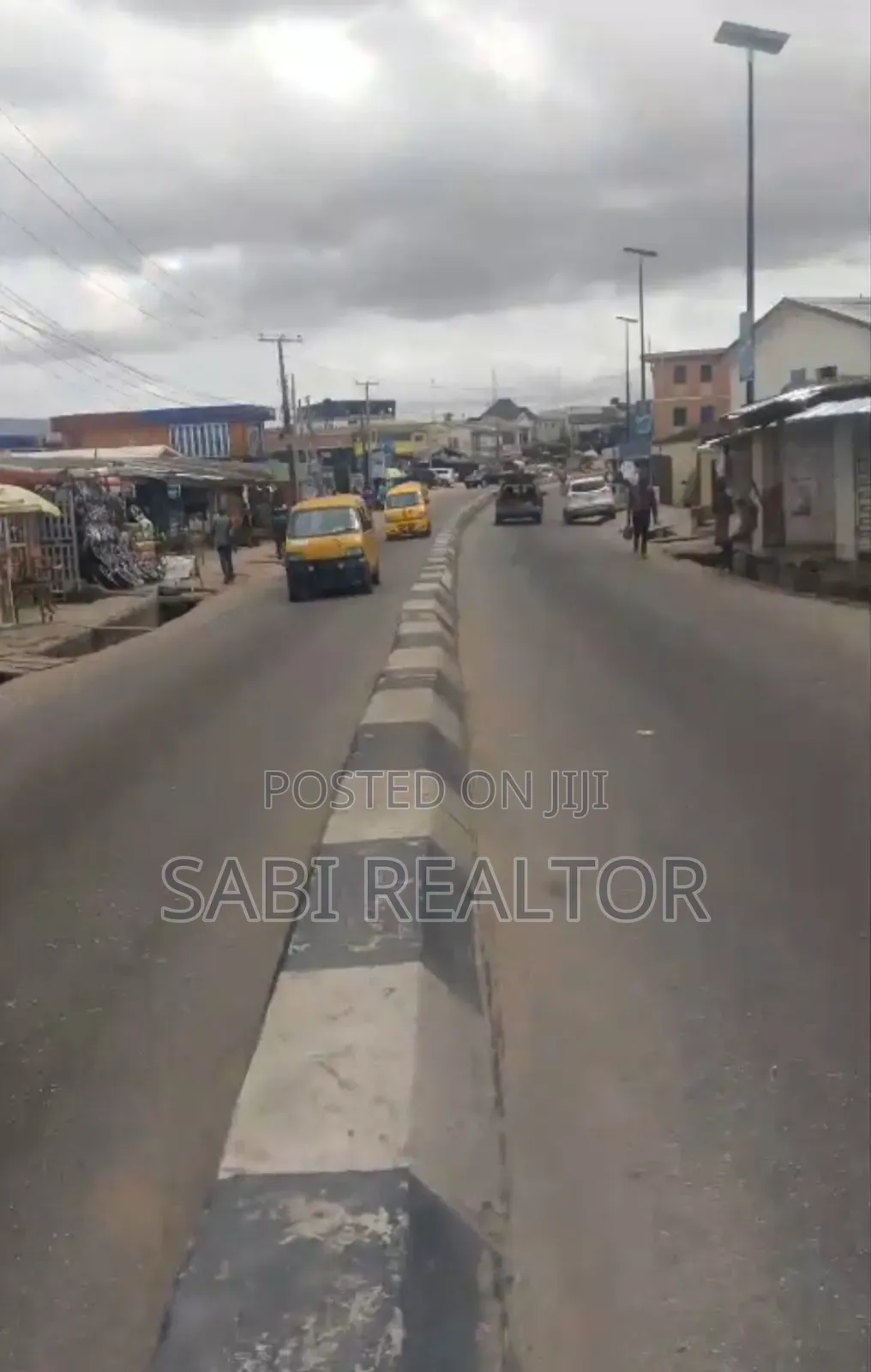 Plaza With 48 Shop Each With Prepaid and Toilet on Akowonjo Road in Akowonjo