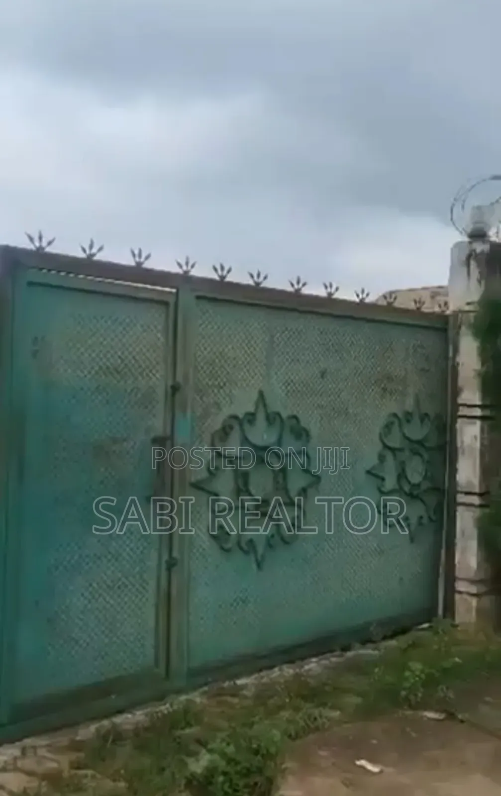 Standard Full Plot Fenced Round Gated at Ikola Very Close to Prime Mart in Ipaja / Ipaja