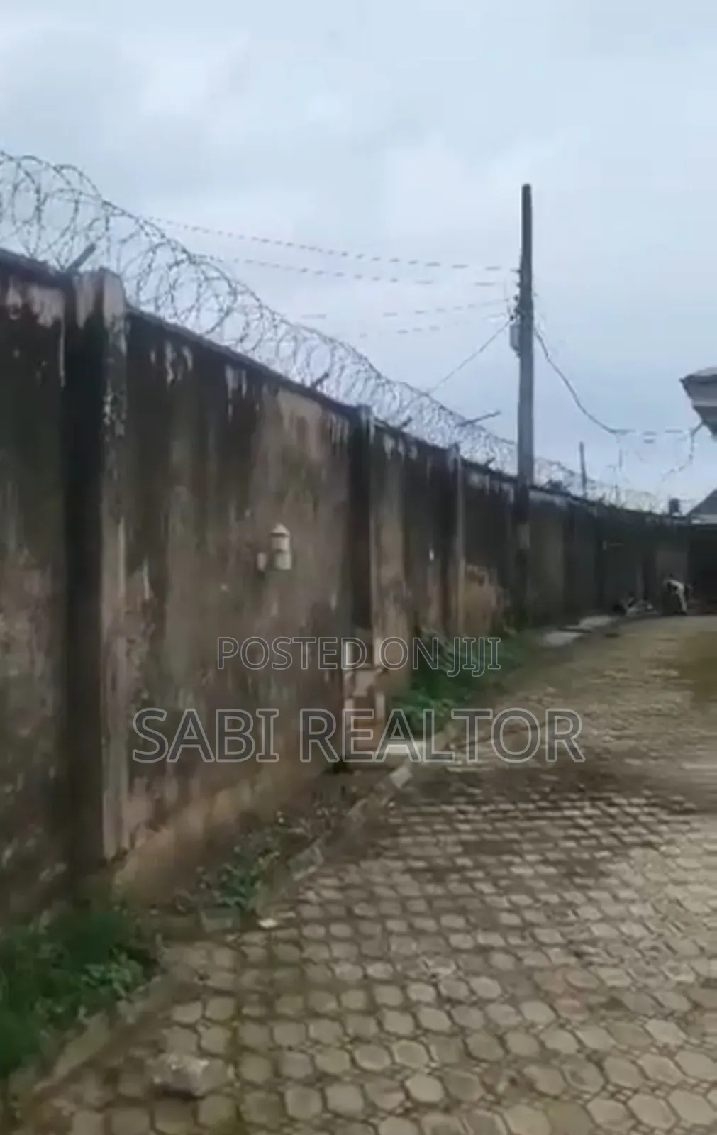 Standard Full Plot Fenced Round Gated at Ikola Very Close to Prime Mart in Ipaja / Ipaja