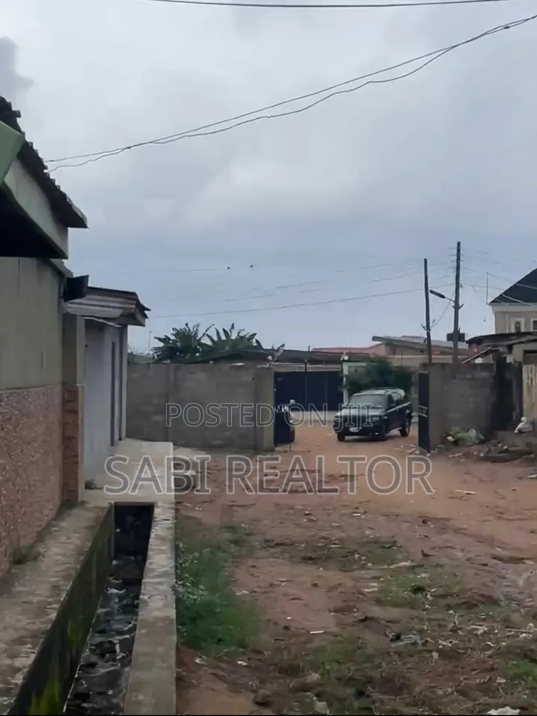 Half Plot in a Mini Estate at JokeAyo | Just a Building to Tarred Road in Alagbado