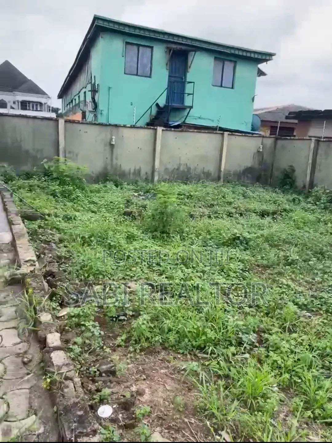 Half Plot in a Mini Estate at JokeAyo | Just a Building to Tarred Road in Alagbado