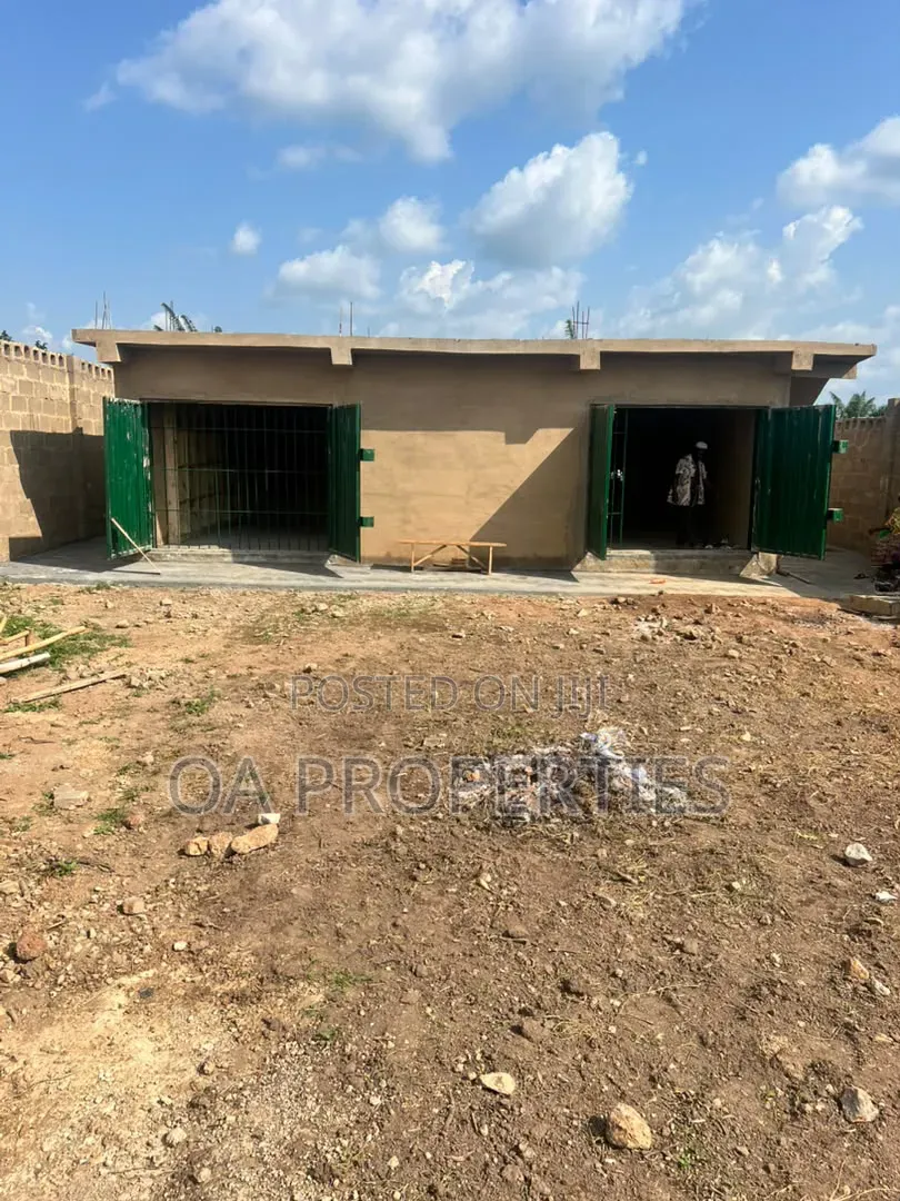 `A Property Facing the Major Road With a Spacious Decking Warehouse, in Ibadan