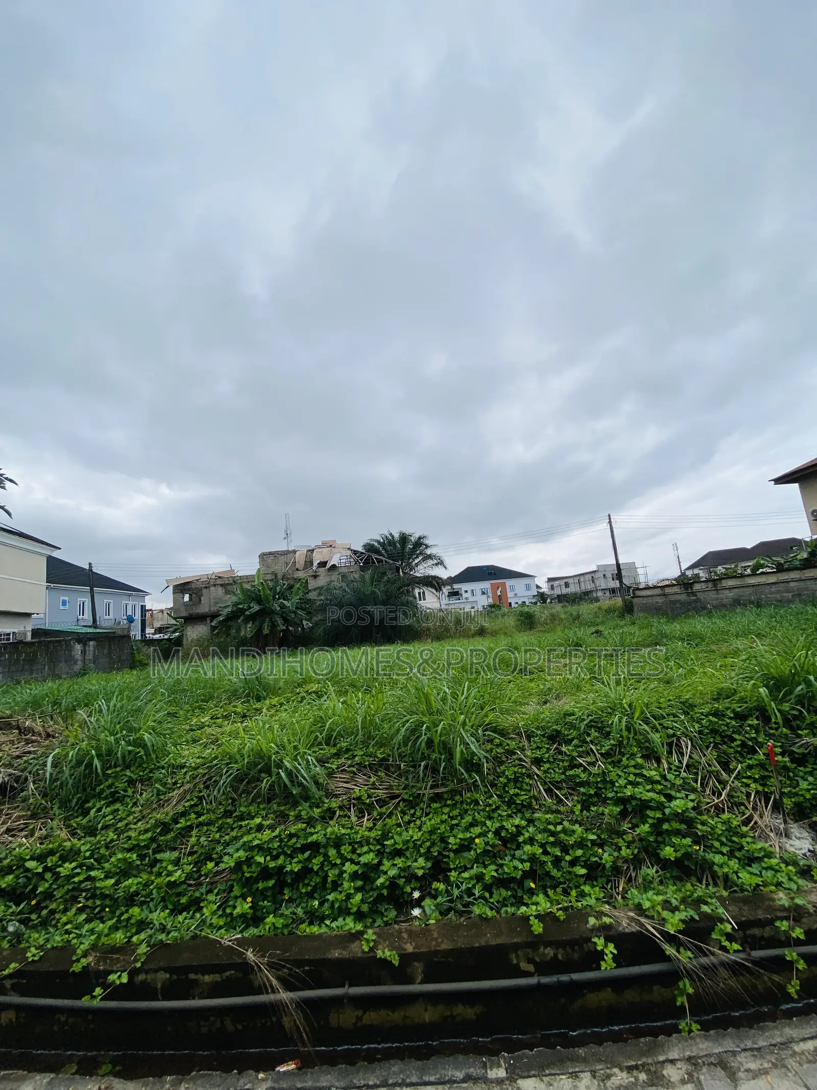 400 SQM Tables Dry Land on a Tarred Road in Ajah