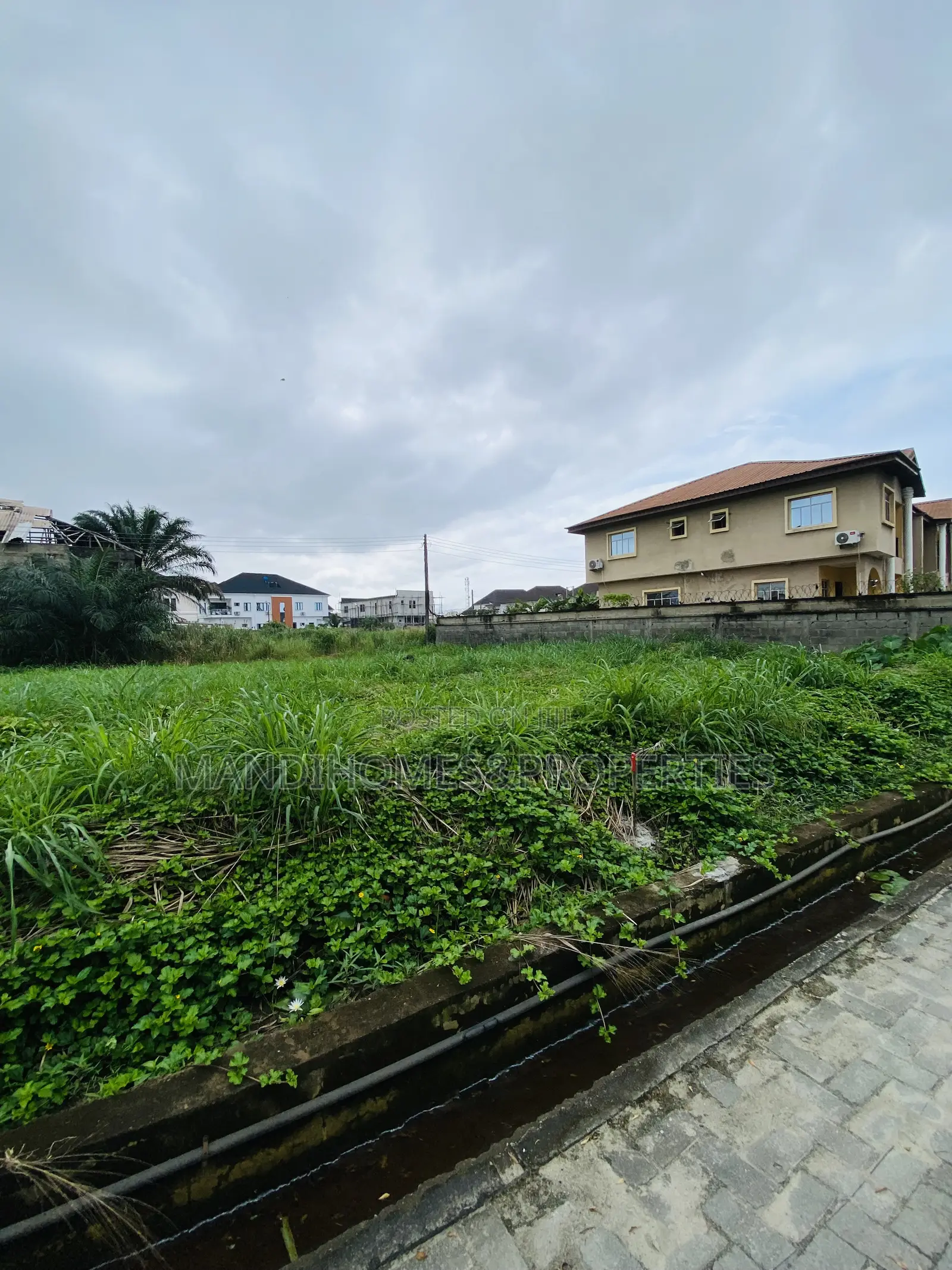 400 SQM Tables Dry Land on a Tarred Road in Ajah