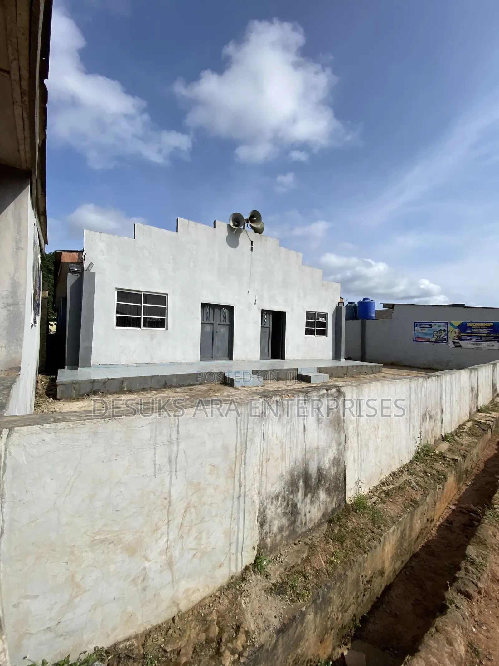 A Land Measured 100ft by 50ft With a Church Structure in Ayobo